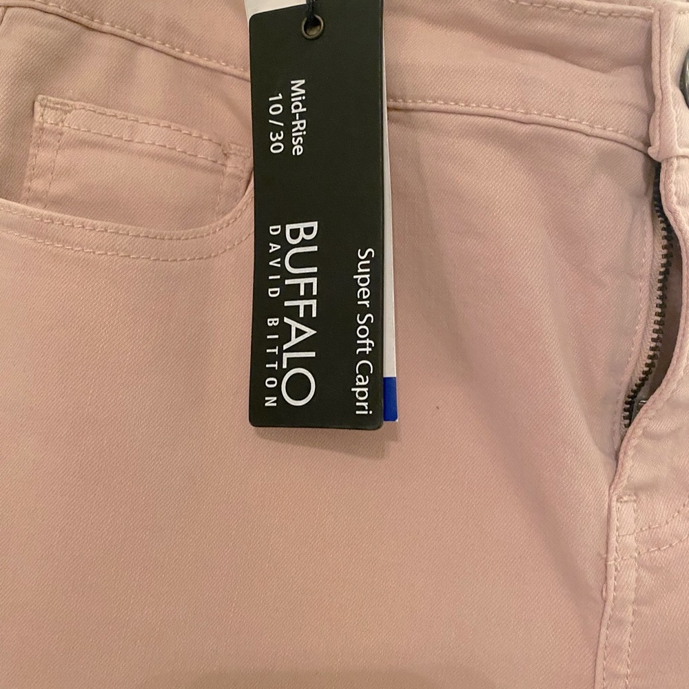 Light pink skinny jeans